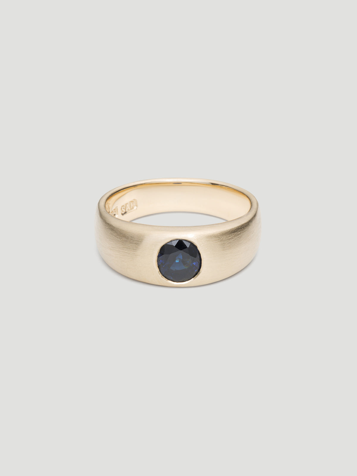 030 - "NOCTURNE" BLUE SAPPHIRE 9K YELLOW GOLD CIGAR BAND