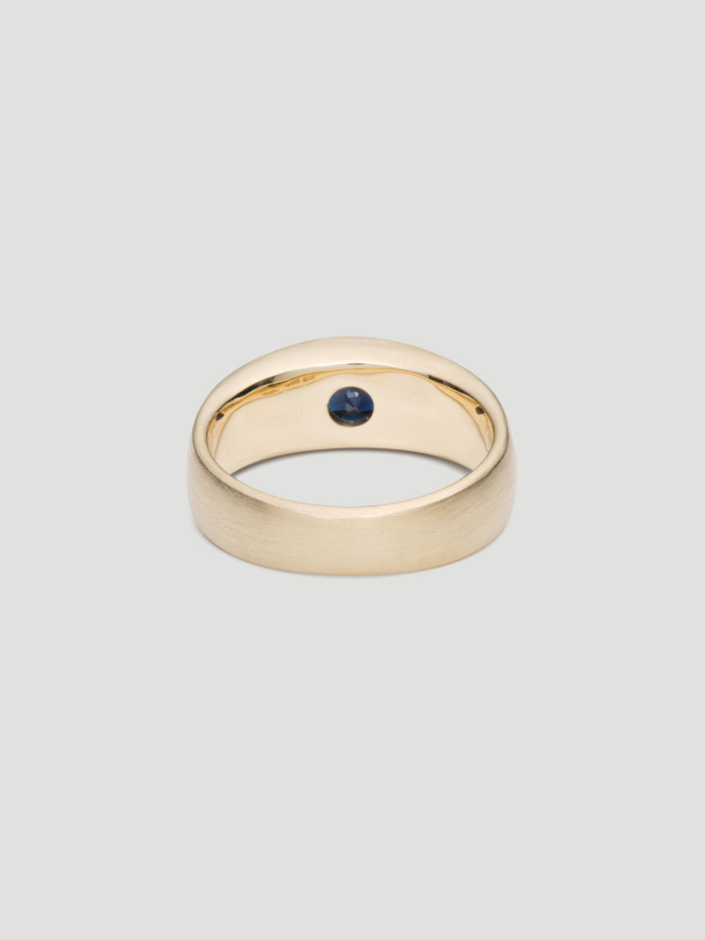 030 - "NOCTURNE" BLUE SAPPHIRE 9K YELLOW GOLD CIGAR BAND