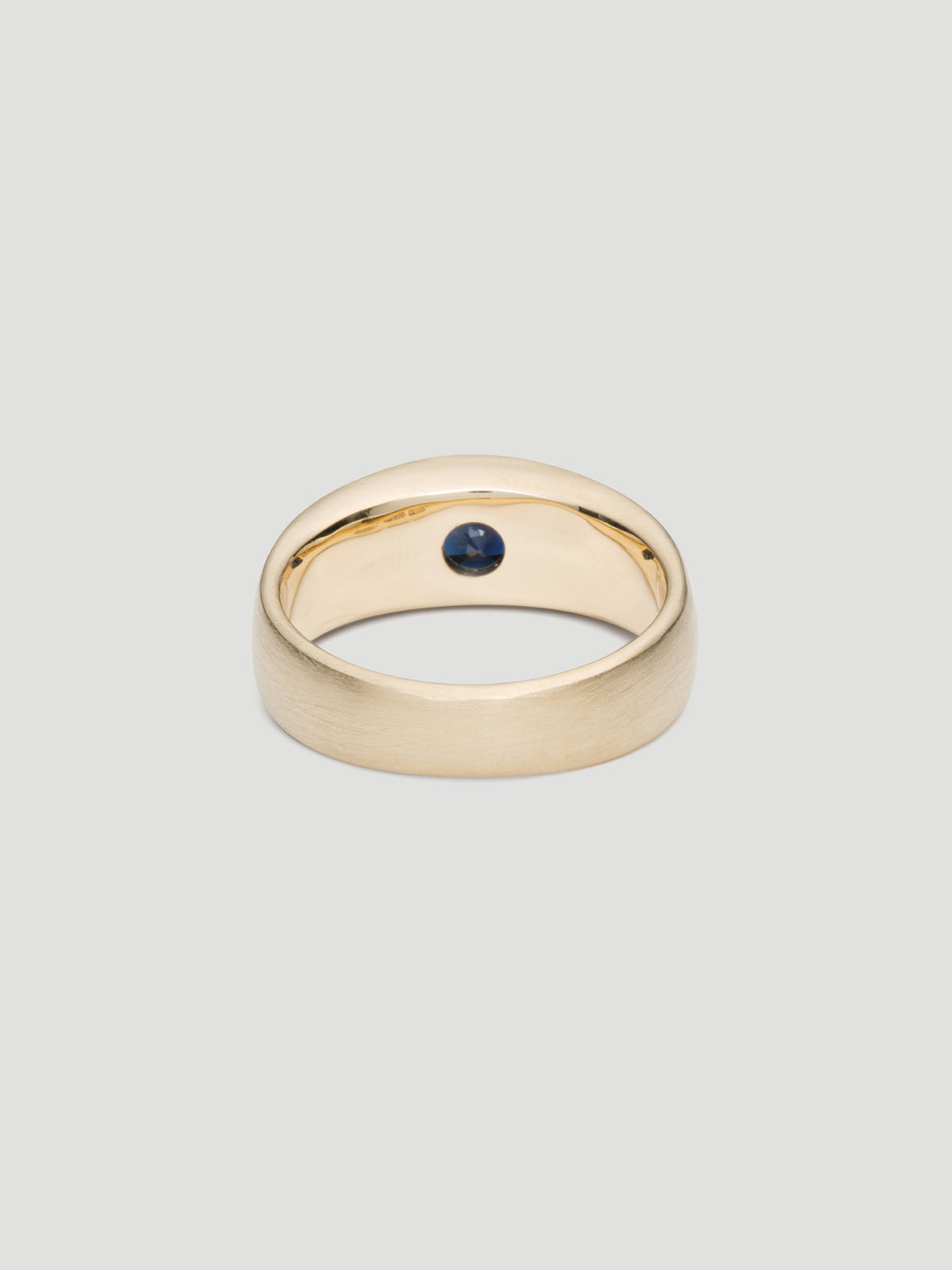 030 - "NOCTURNE" BLUE SAPPHIRE 9K YELLOW GOLD CIGAR BAND