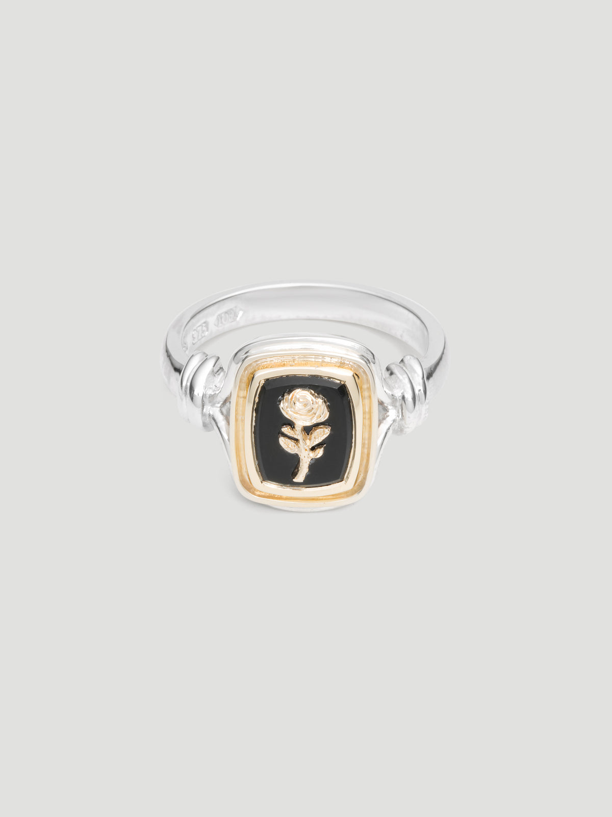 029 - "NOIR" BLACK ONYX 9.25 STERLING SILVER AND 9K GOLD SIGNET RING