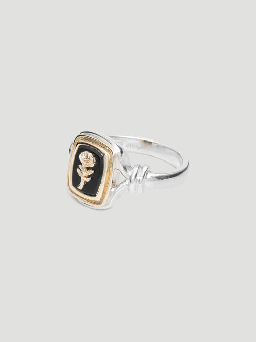 029 - "NOIR" BLACK ONYX 9.25 STERLING SILVER AND 9K GOLD SIGNET RING