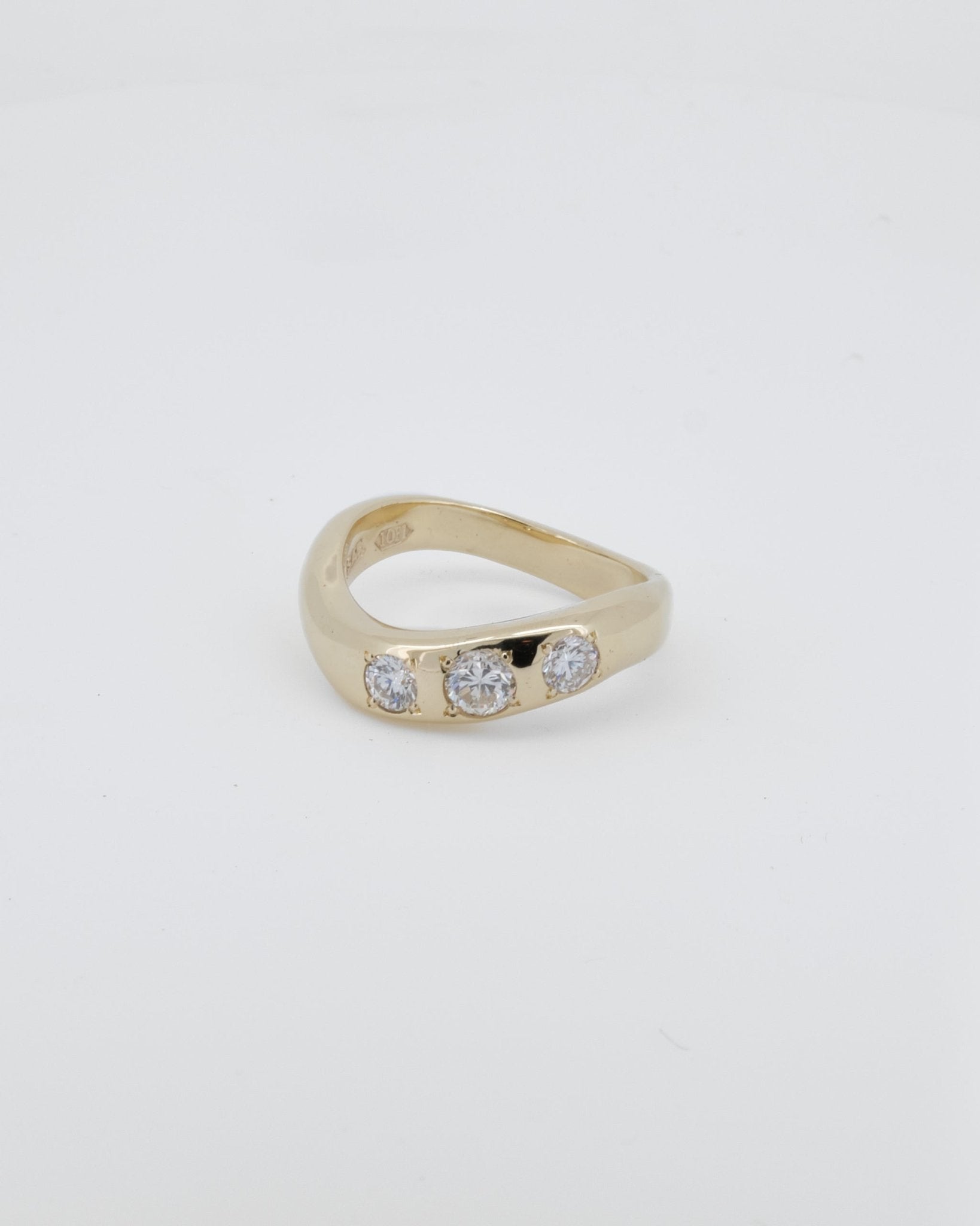 Wavy half round band made in 9kt yellow gold with re - purposed white diamonds. - Sar Jewellery